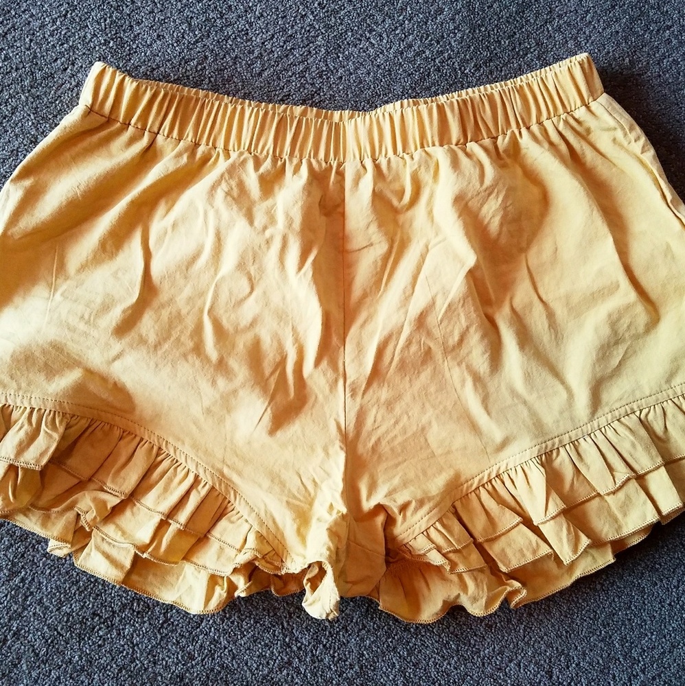 Mustard yellow ruffle shorts